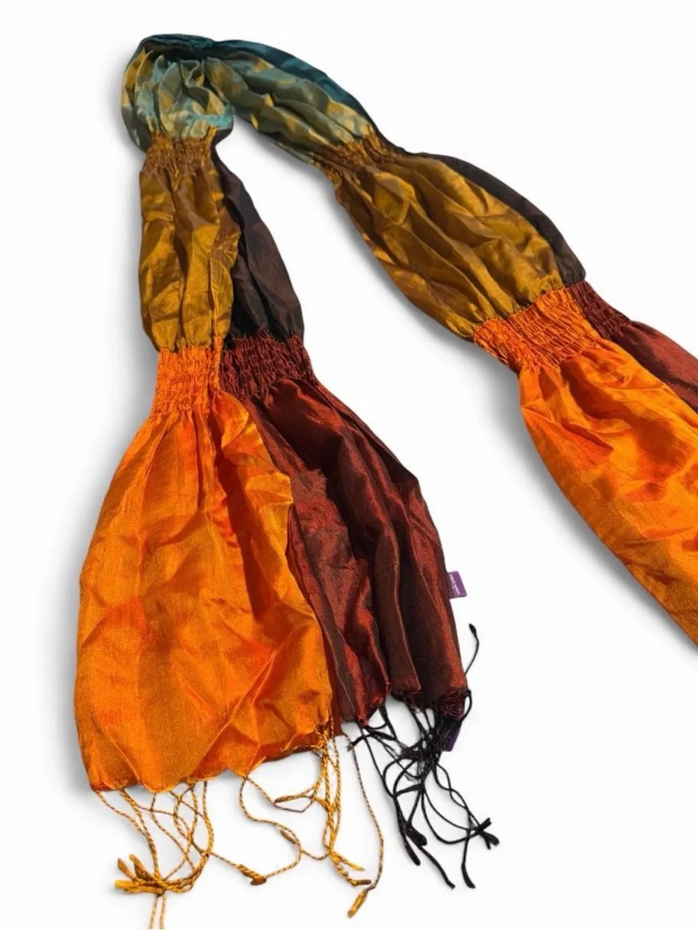 Orange, brown, and teal gradient silk scarf with fringe
